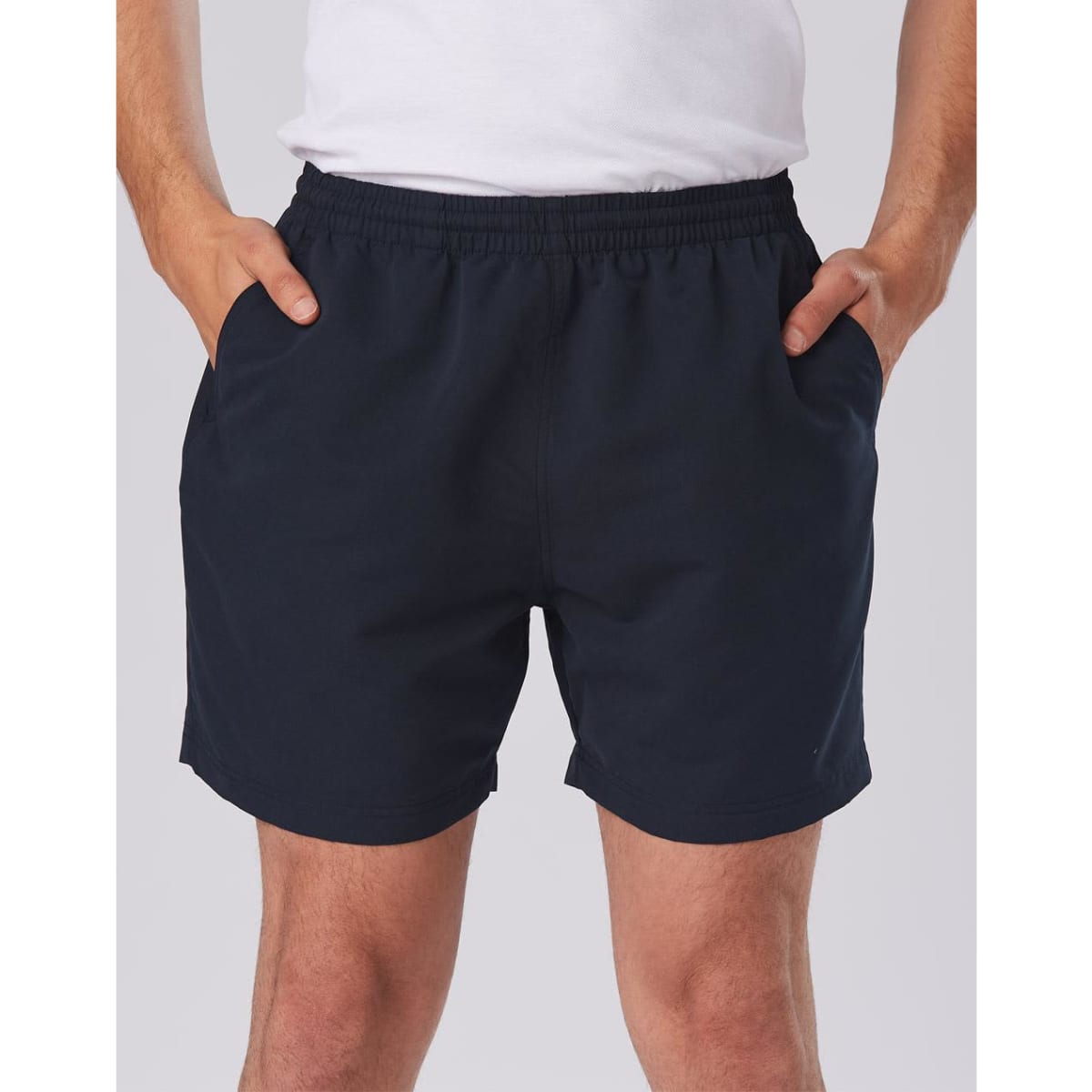 Adult microfibre shorts in navy blue with an elastic waistband and side pockets. Features a logo on the hem.