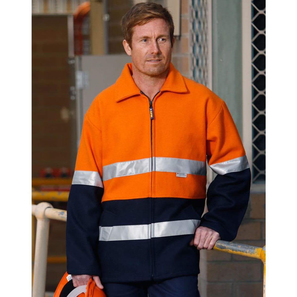 A high-visibility two-tone safety jacket featuring orange and navy colours with reflective 3M tape.