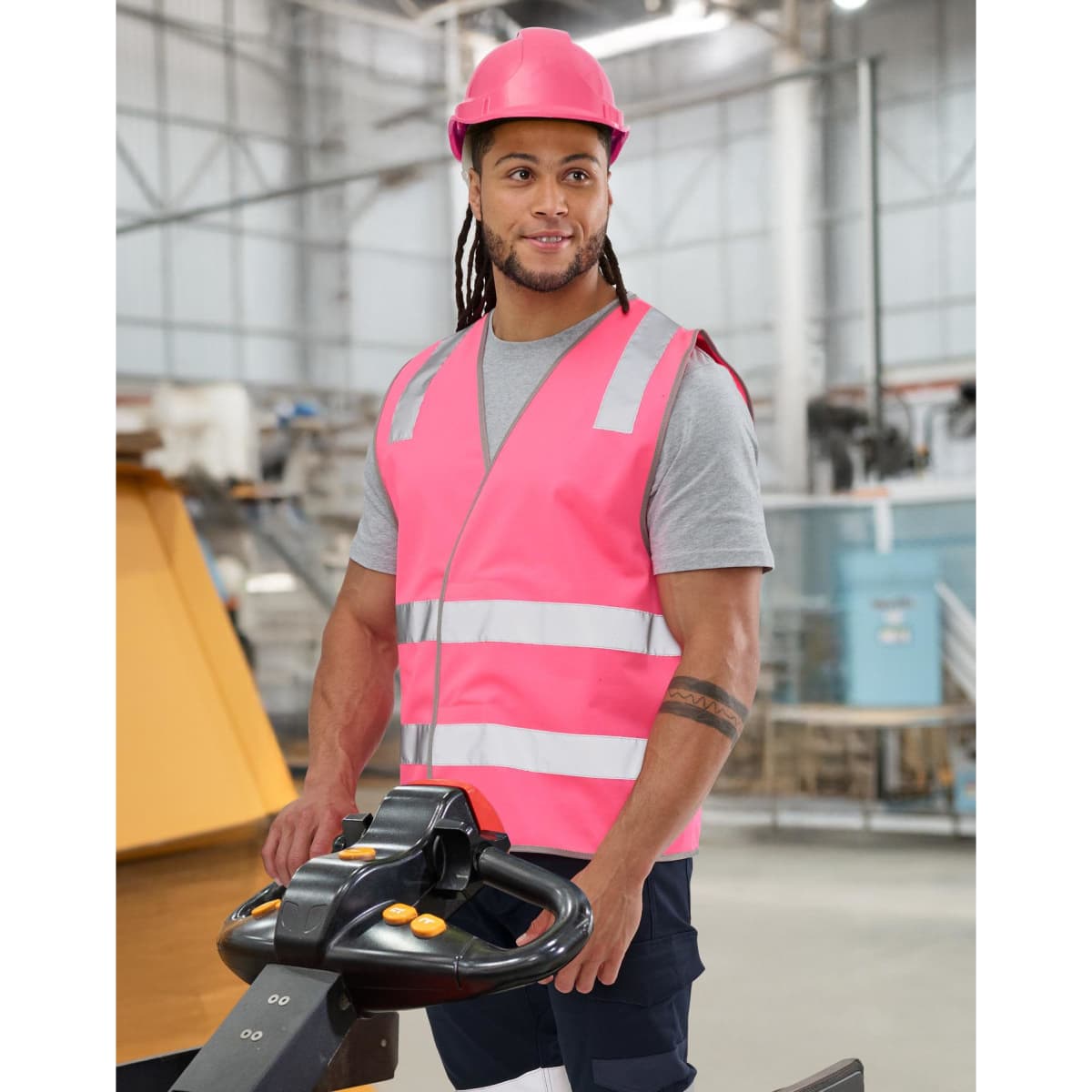 Hi vis safety vests in fluorescent yellow and orange, featuring reflective shoulder tapes, worn by a male and female model.