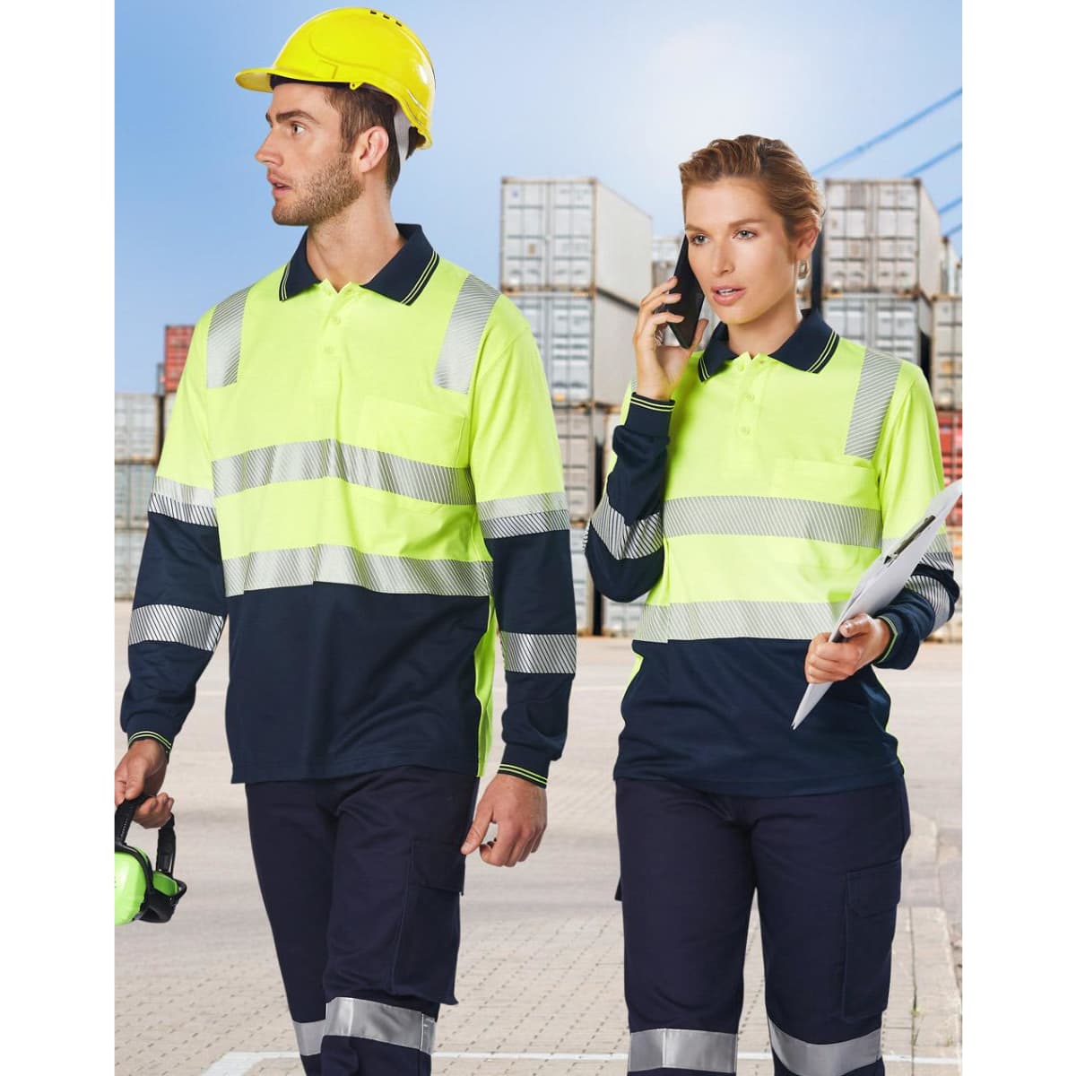 A high-visibility long-sleeve safety polo in luminous yellow and navy blue, featuring reflective stripes and logos.