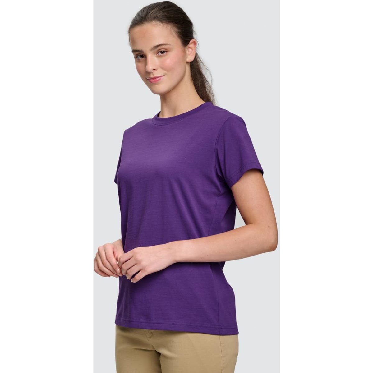 A bright pink semi-fitted T-shirt for ladies, featuring a classic crew neck and short sleeves.