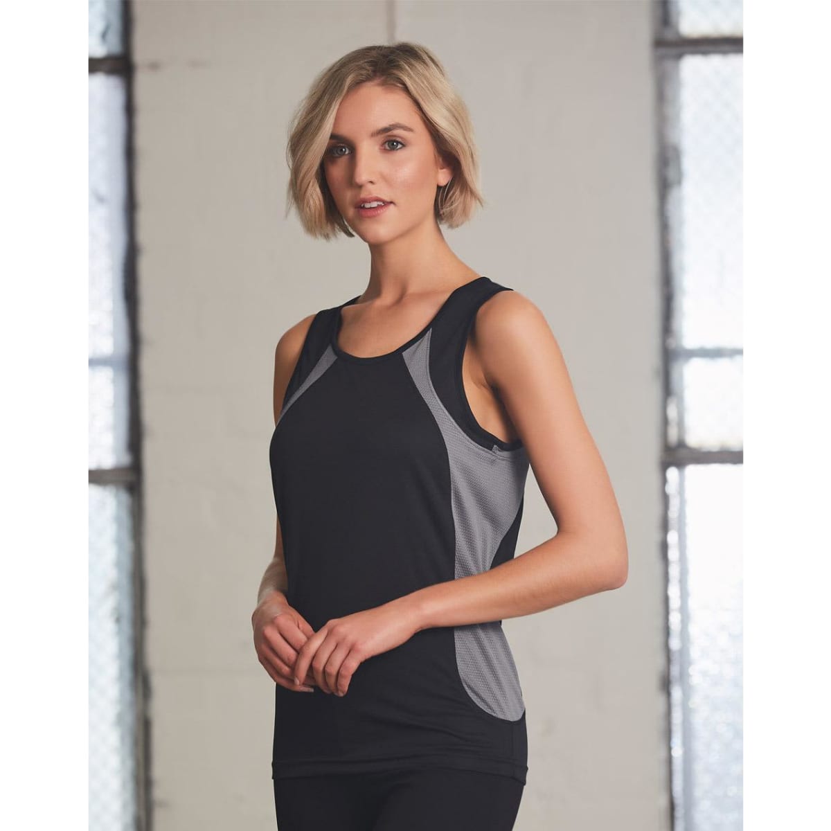 A black ladies' sprint singlet featuring grey side panels and a logo, designed for active wear.