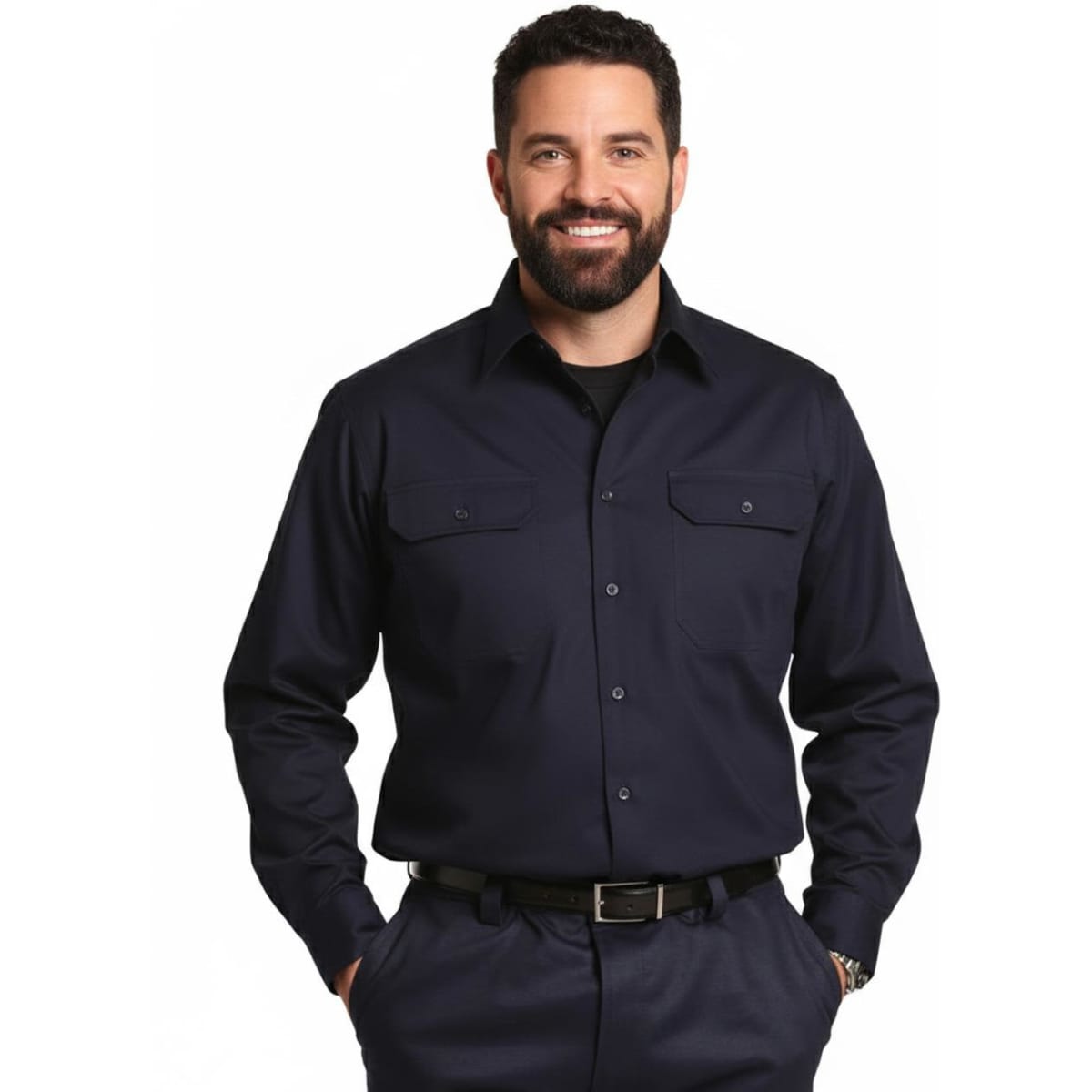 A man wearing a navy long-sleeve cotton work shirt with two front pockets and a button-down collar.