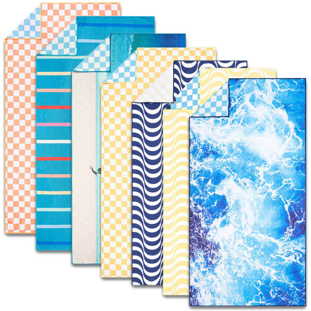 A collection of sand-free beach towels in various patterns and colours, including blue, orange, and yellow. Each towel features a unique design.