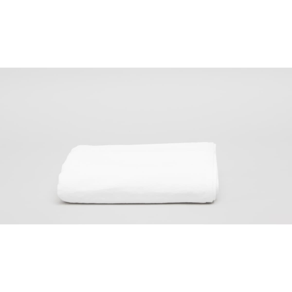 A folded white beach pool towel, 380 gsm, displayed against a plain grey background.