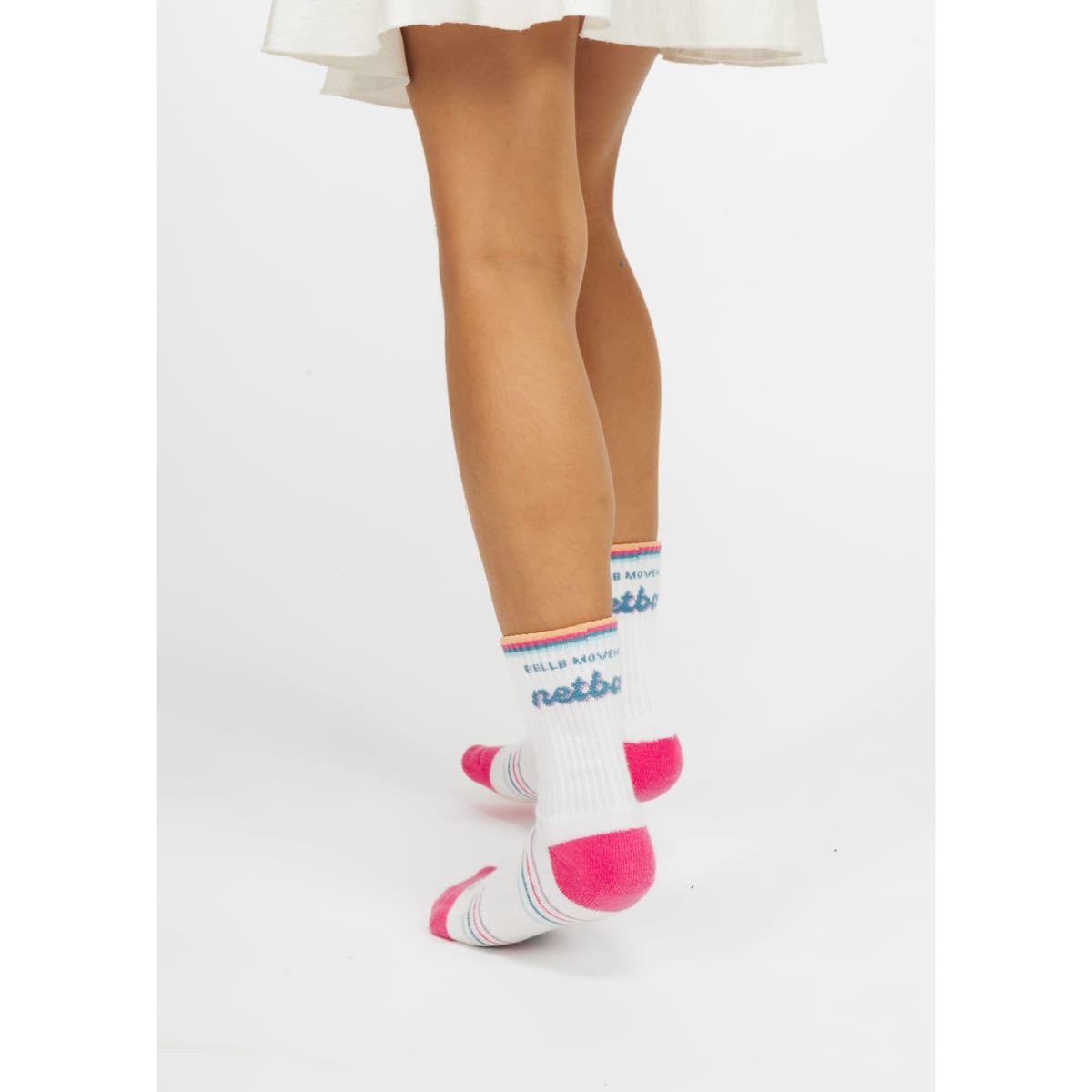 Custom branded kids socks featuring white fabric with pink accents and blue text, showcased from the back.
