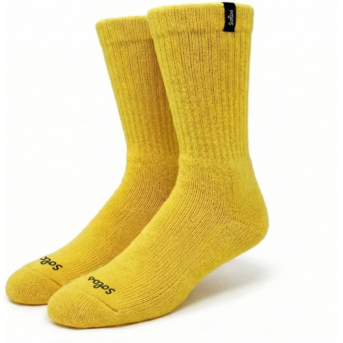 A pair of thick bamboo workwear socks in bright yellow, featuring a logo and ribbed texture.