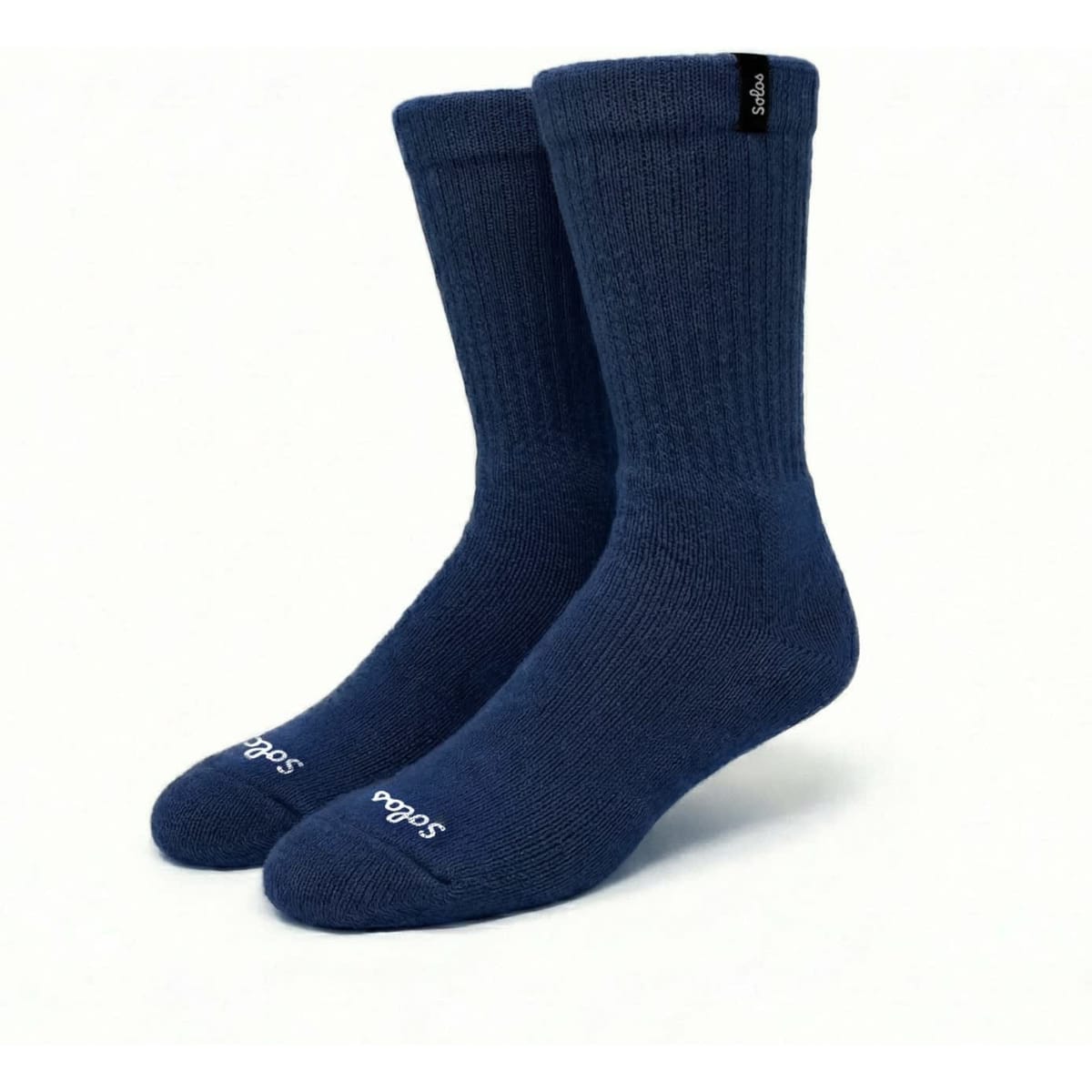 A pair of navy blue heavy cotton workwear socks featuring a logo on the cuff and ribbed structure.