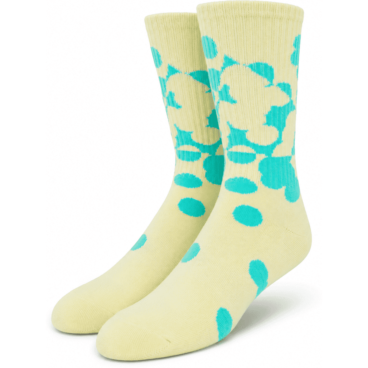 A pair of custom athletic socks in yellow with a turquoise polka dot pattern and a logo.