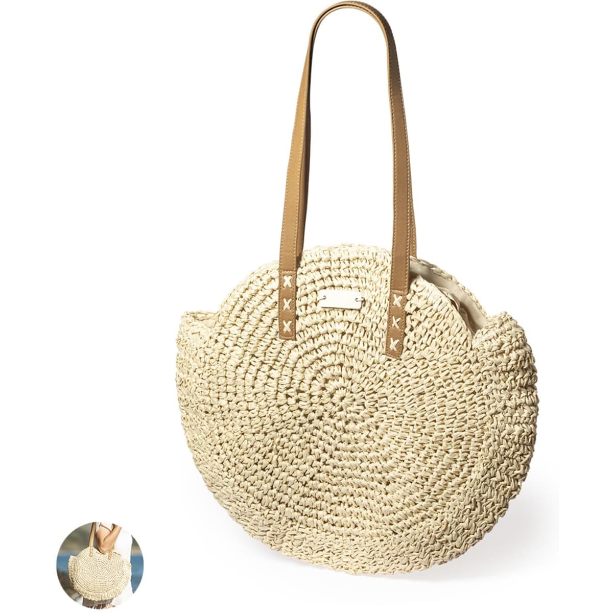 A round, cream-coloured tote bag with tan straps, featuring a woven design and a logo.
