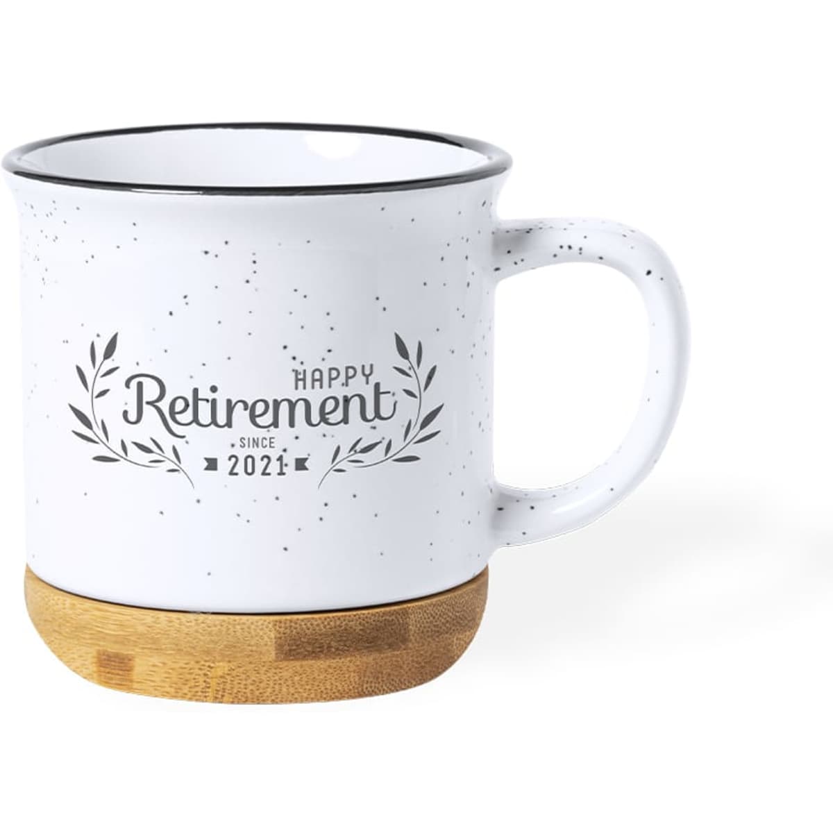 A coffee mug in white with black speckles and a bamboo base, featuring a retirement-themed design.