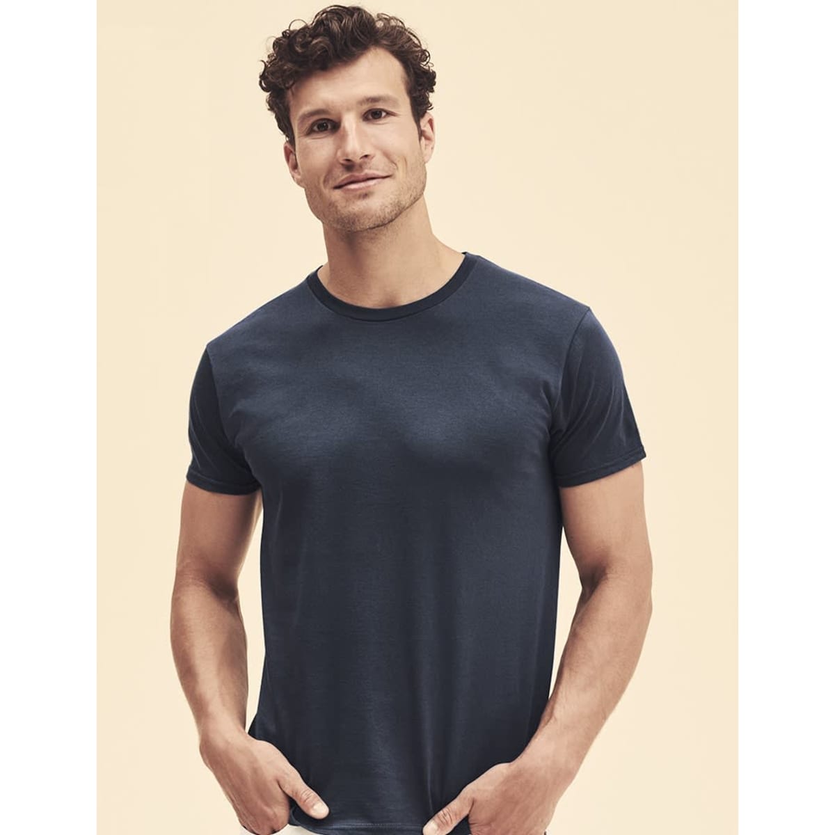 A navy blue T-shirt with short sleeves, featuring a fitted design and a subtle logo.
