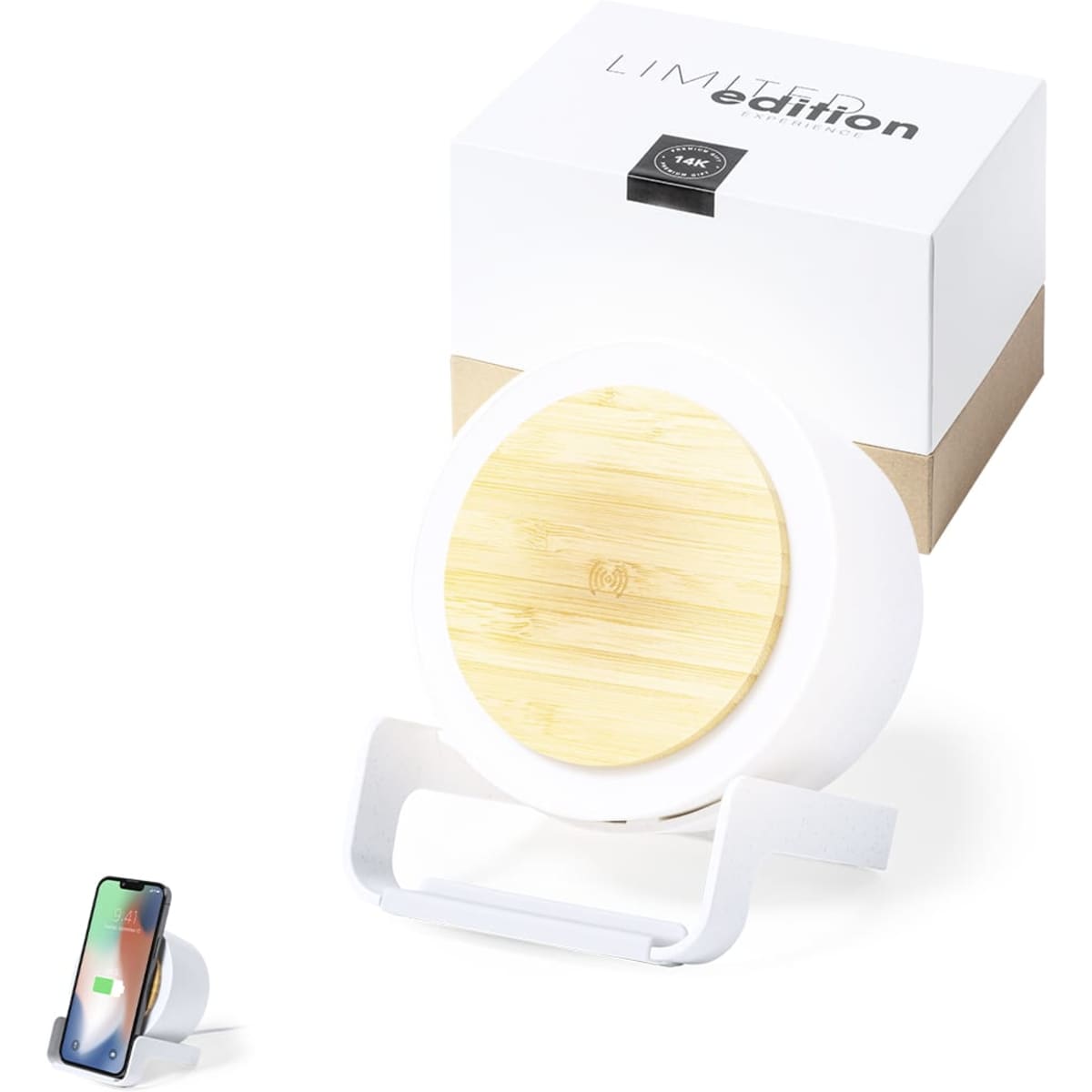 A wireless charger with a bamboo top and a white base, accompanied by a smartphone and a promotional box.