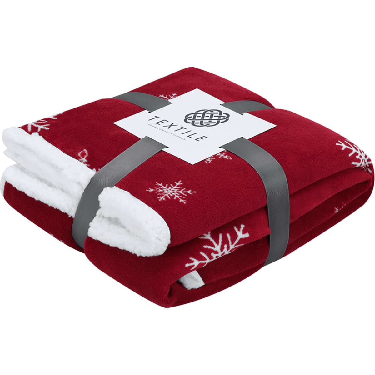 A red blanket with white snowflake patterns, neatly folded and tied with a grey ribbon. Features a branding label.