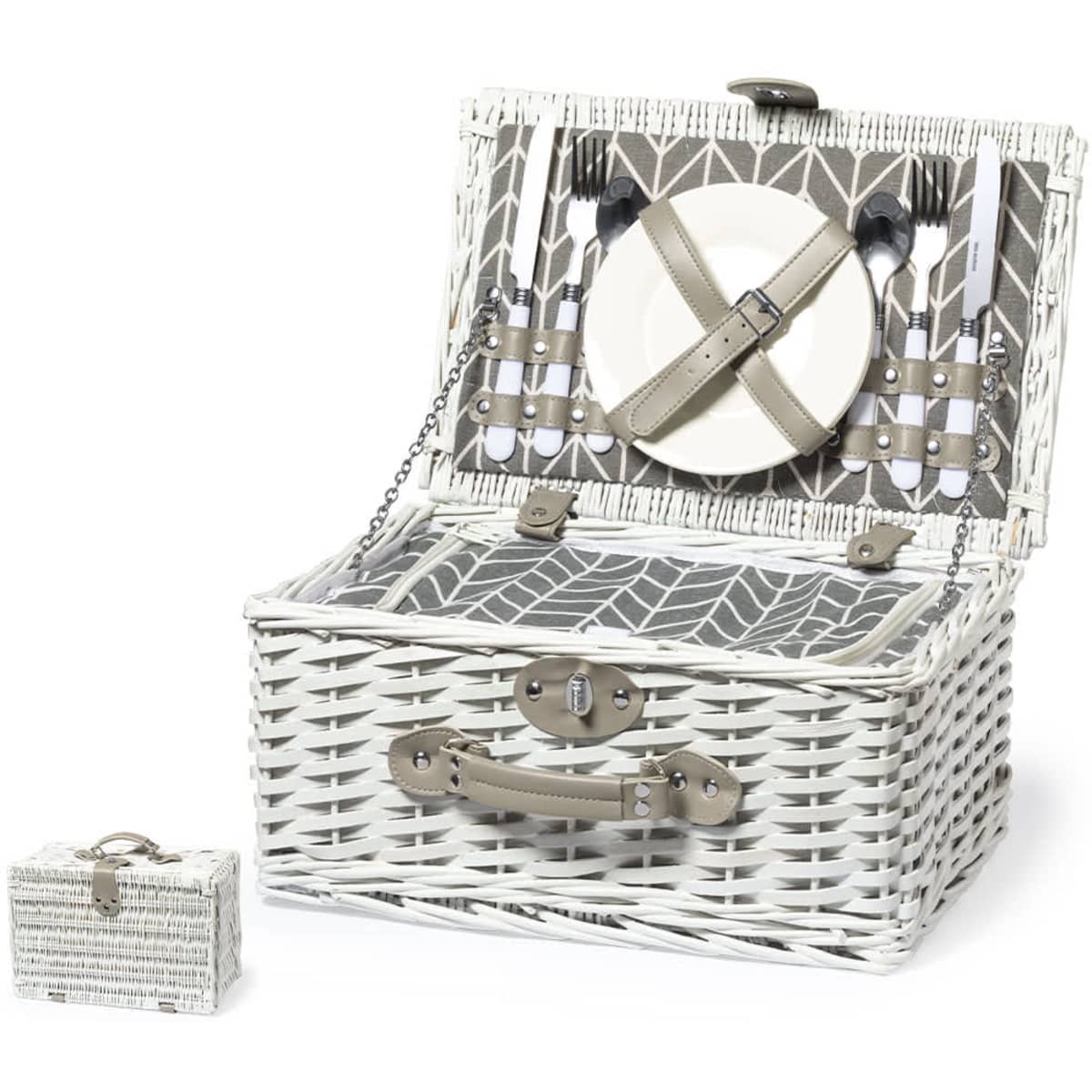 A white wicker picnic basket with a patterned interior, containing plates and utensils, plus a small matching container.