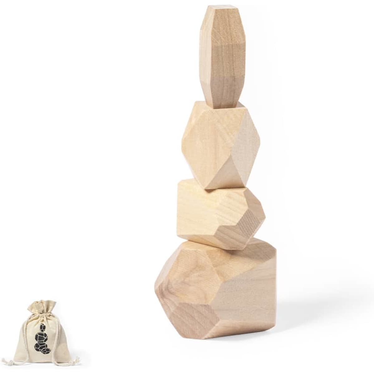 A set of four wooden geometric blocks in natural wood colour, stacked creatively, with a small fabric bag beside them.