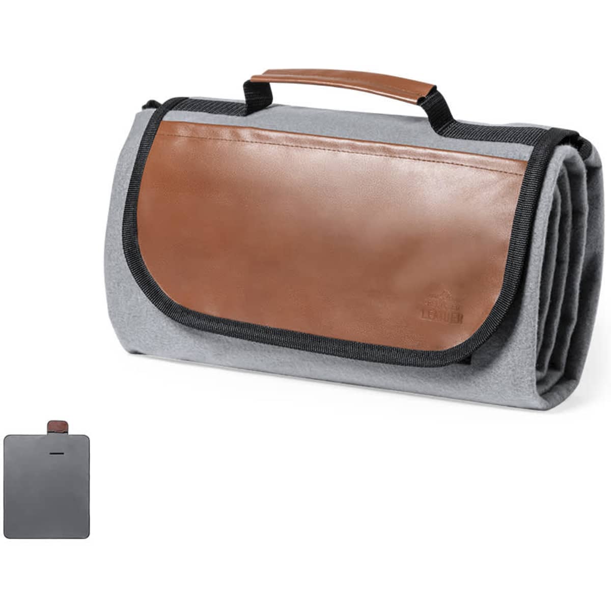 A grey picnic rug with a brown leather handle and a folded design. It has a logo on one side.