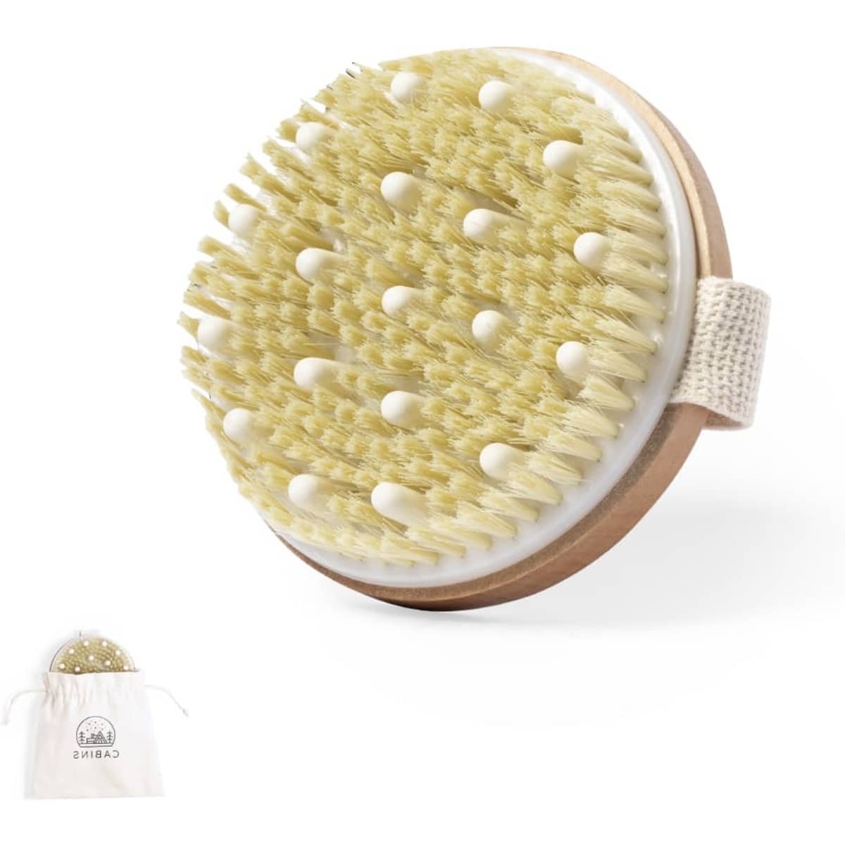 A round body brush with natural bristles and a wooden handle, accompanied by a cream canvas bag.