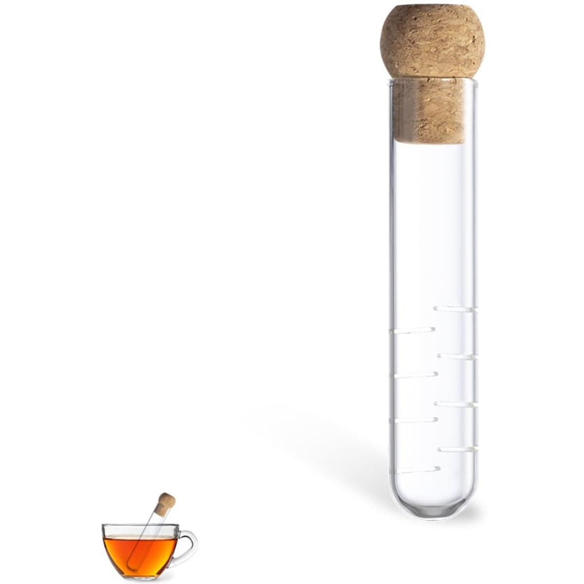 A glass drink bottle with a cork stopper, featuring measuring markings, alongside a cup of tea.