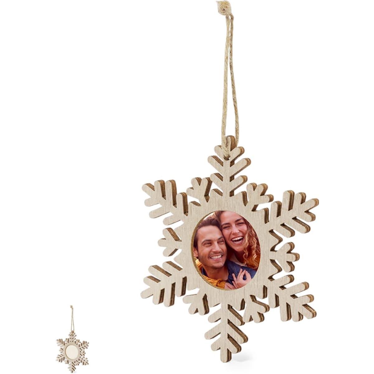 A wooden snowflake photo frame with an intertwined design, featuring a circular space for a photo and a hanging string.