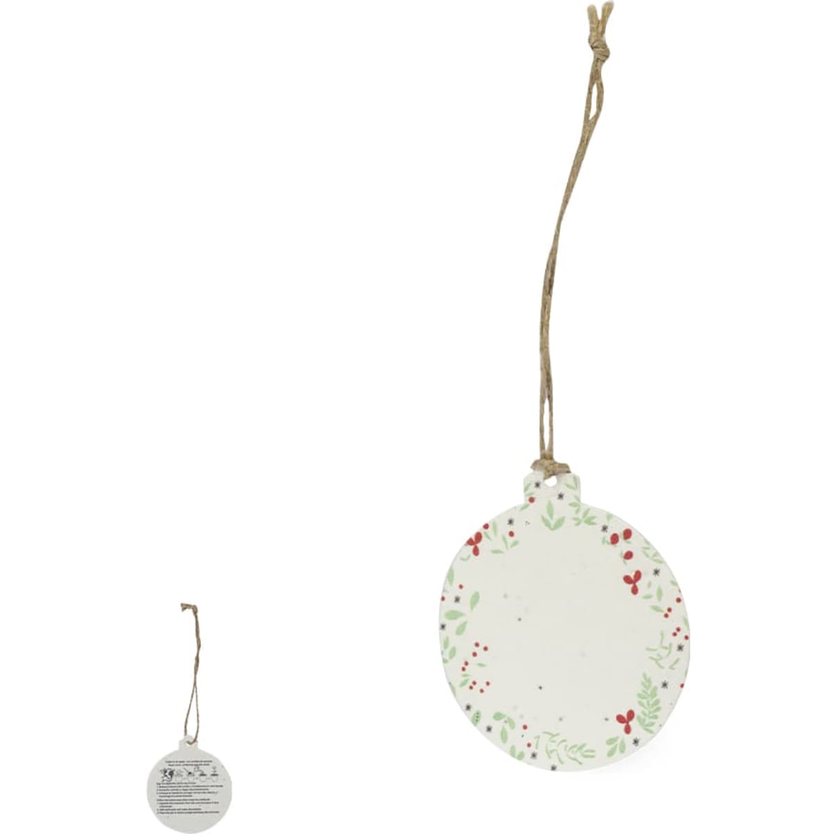 A circular decorative tag with a floral design in green and red, featuring a hanging twine.