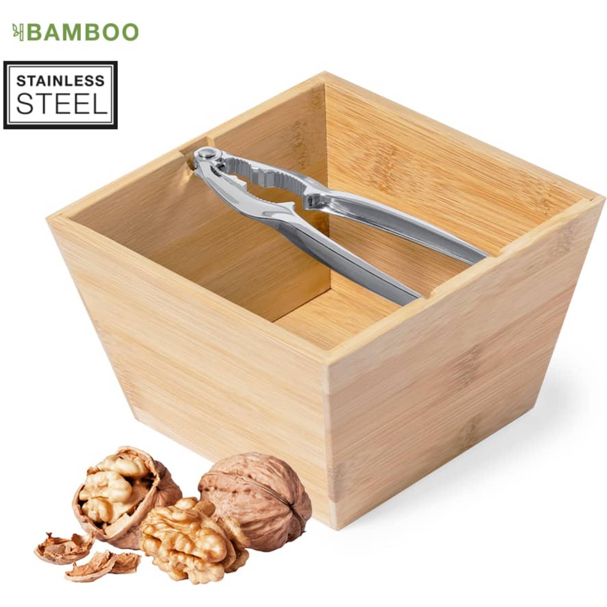 A bamboo nutcracker set with stainless steel tools, accompanied by whole walnuts in their shells.