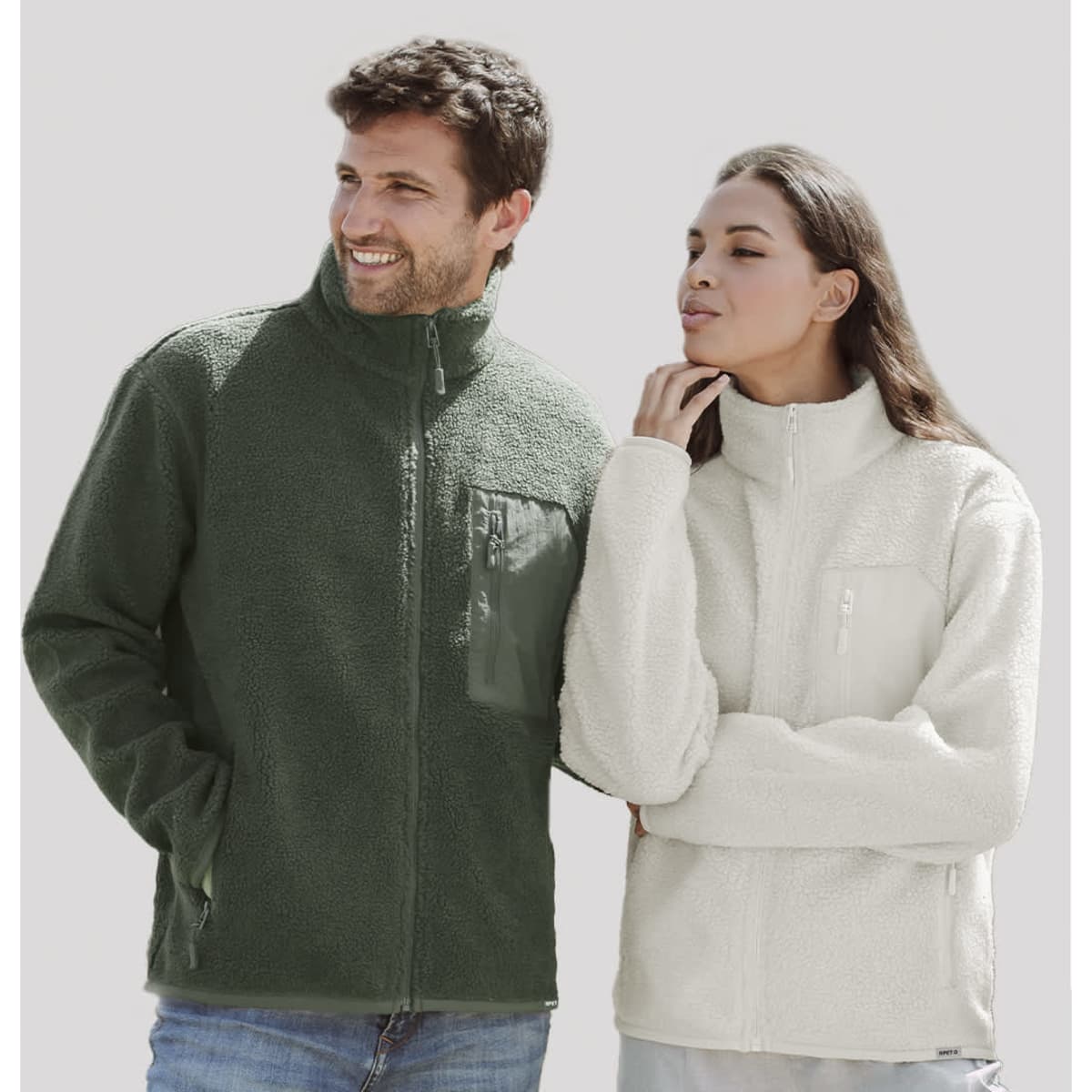 A polar fleece jacket in green and a white variant, featuring a logo and a zippered front.