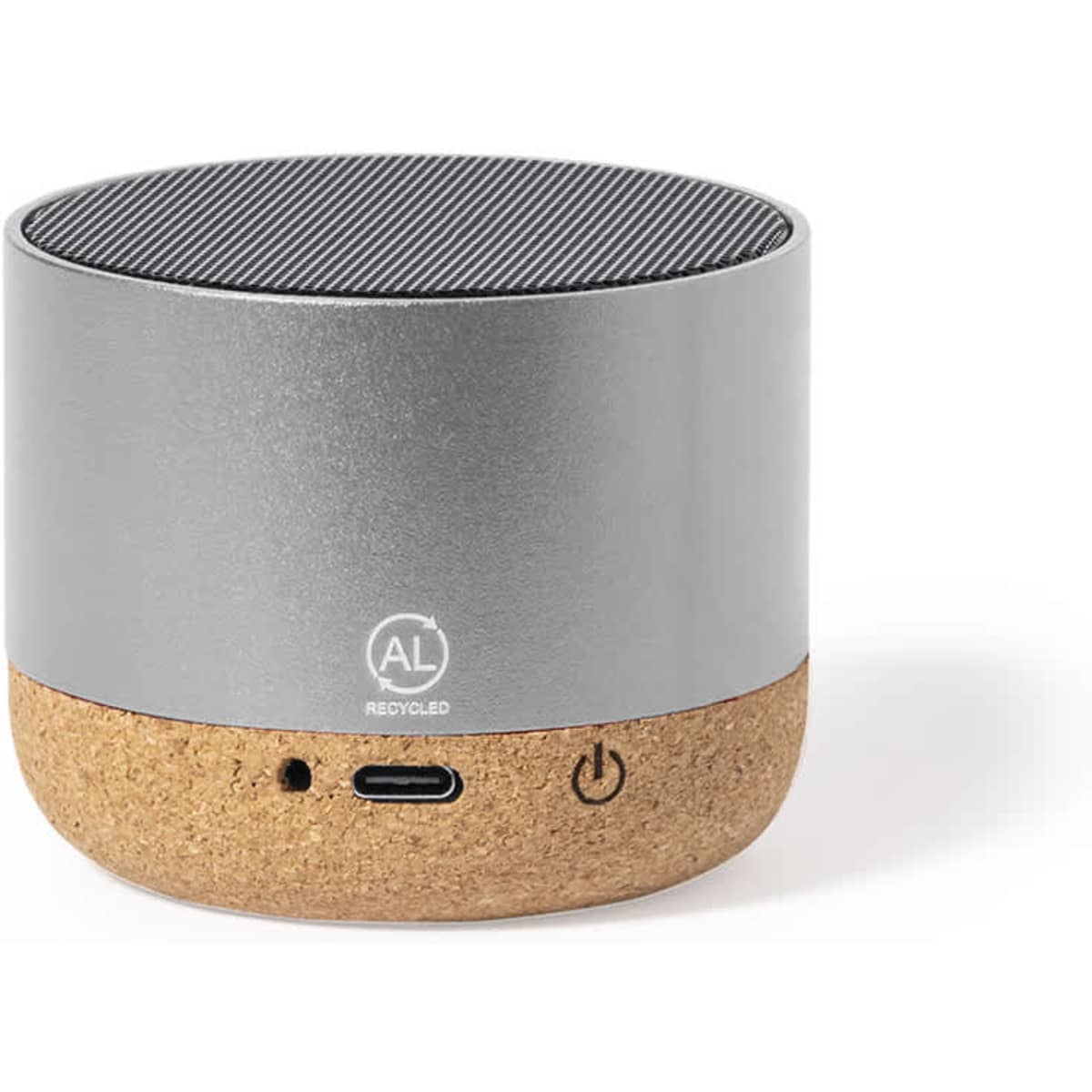 A small, cylindrical Bluetooth speaker in silver and cork, featuring a textured top and a subtle logo.