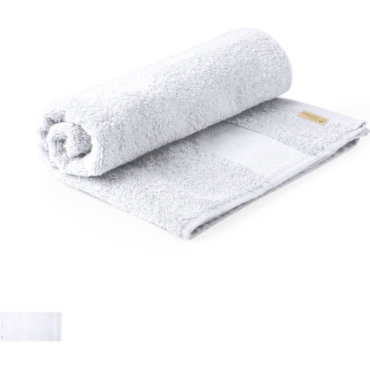 A rolled white bath towel featuring a textured surface and a branding label.