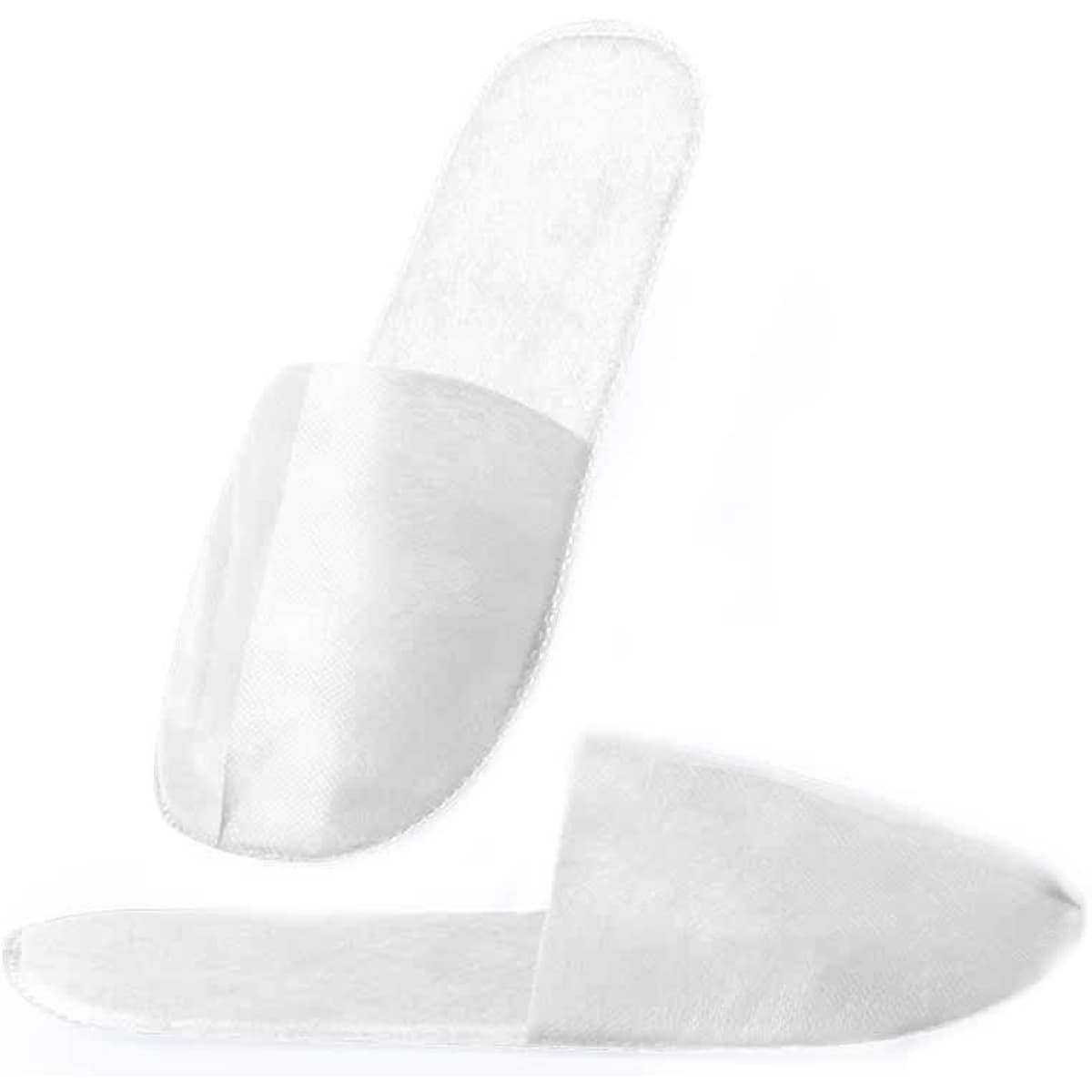 A pair of white slip-on footwear with a simple, minimalist design. The product features a logo on the side.