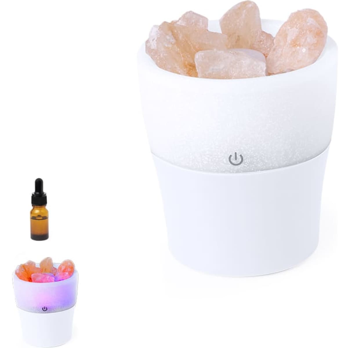 A white decorative lamp featuring pink Himalayan salt crystals, with a small amber dropper bottle alongside it.