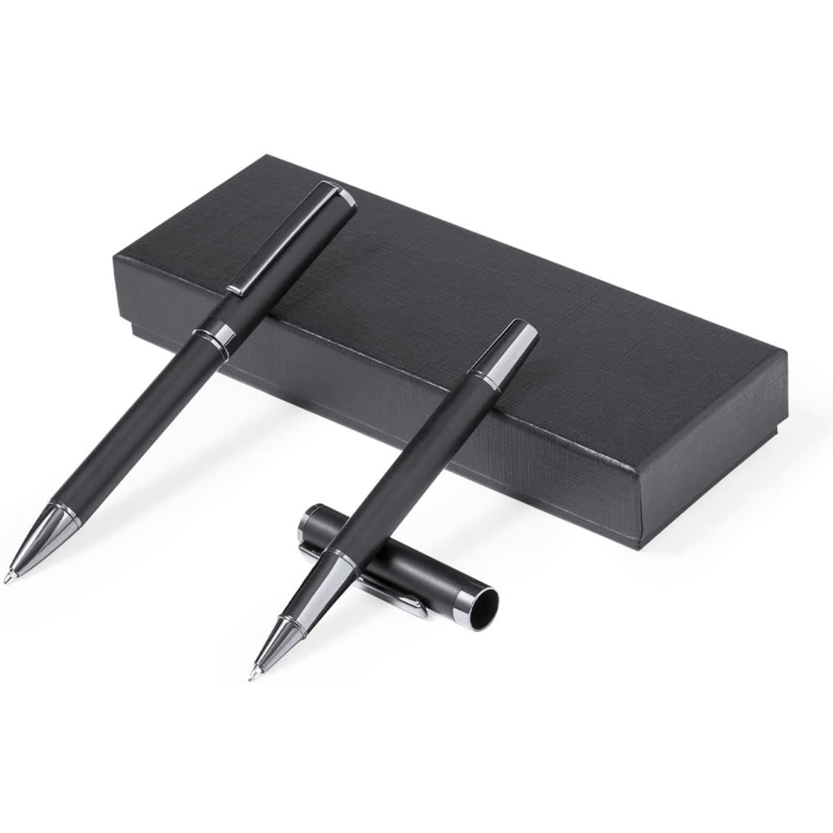 A set of two black metal pens positioned on a sleek black gift box, featuring a logo.