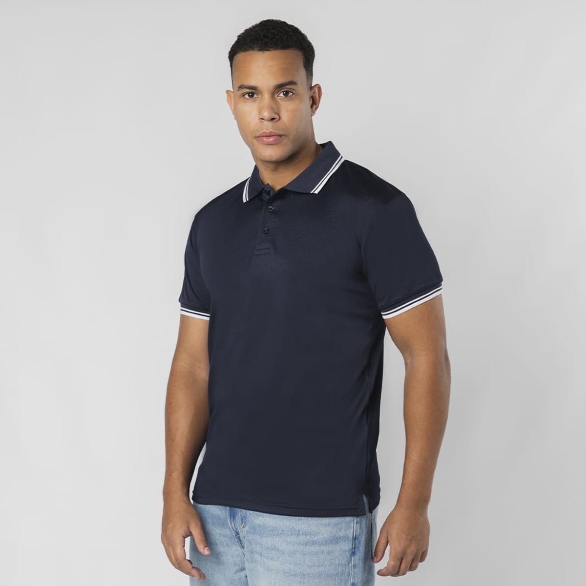 A navy blue polo shirt with contrasting stripes, featuring a collar and short sleeves. The shirt has a logo.