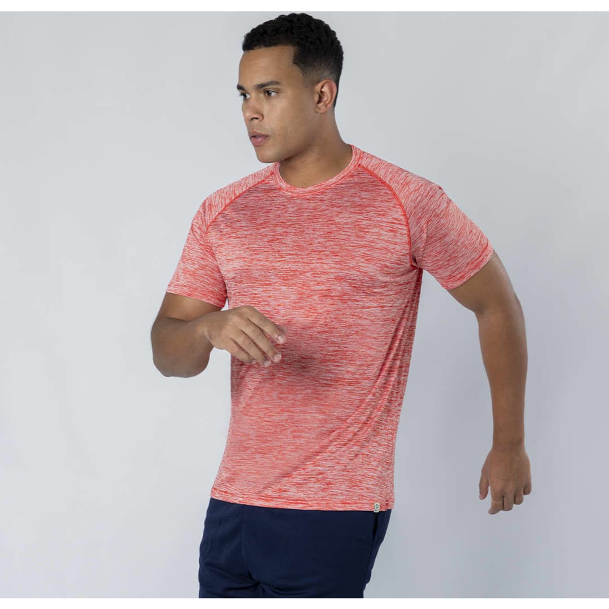 A red and grey striped Kassar T-Shirt worn by a male model, designed for active wear.