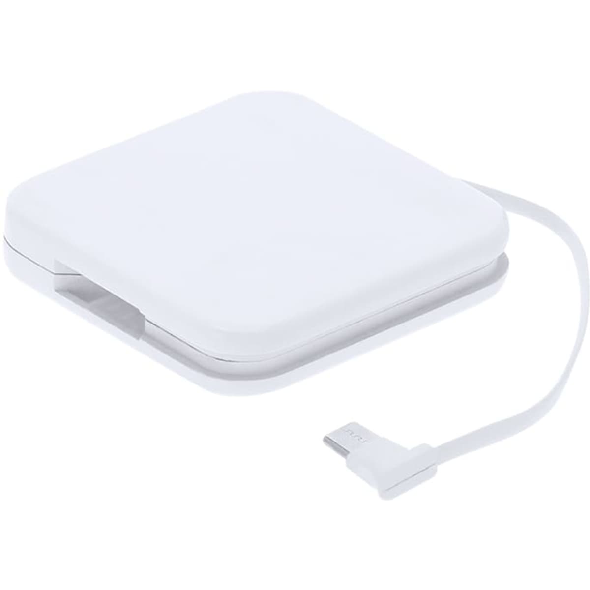 A square white power bank with an attached charging cable and a logo on its surface.