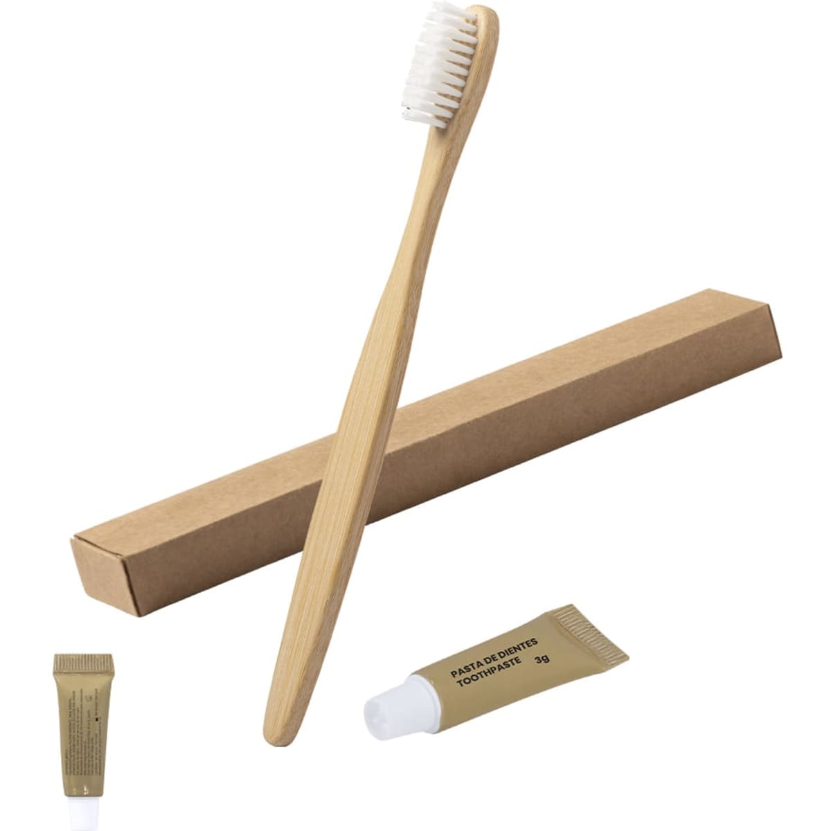 A bamboo toothbrush with soft bristles, accompanied by a small tube of toothpaste, presented in a brown cardboard box.