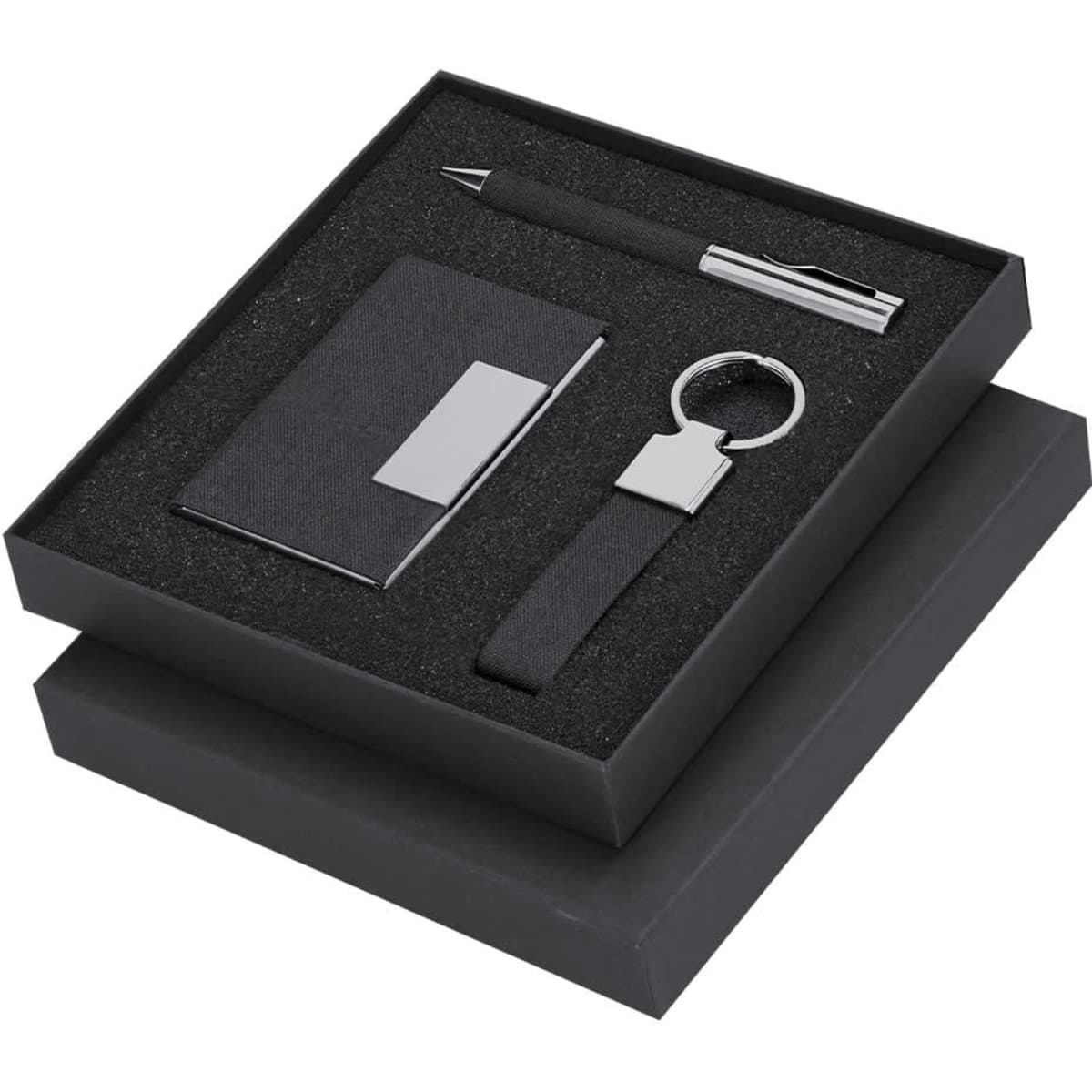 A black gift set containing a pen, keyring, and business card holder, presented in a stylish box.