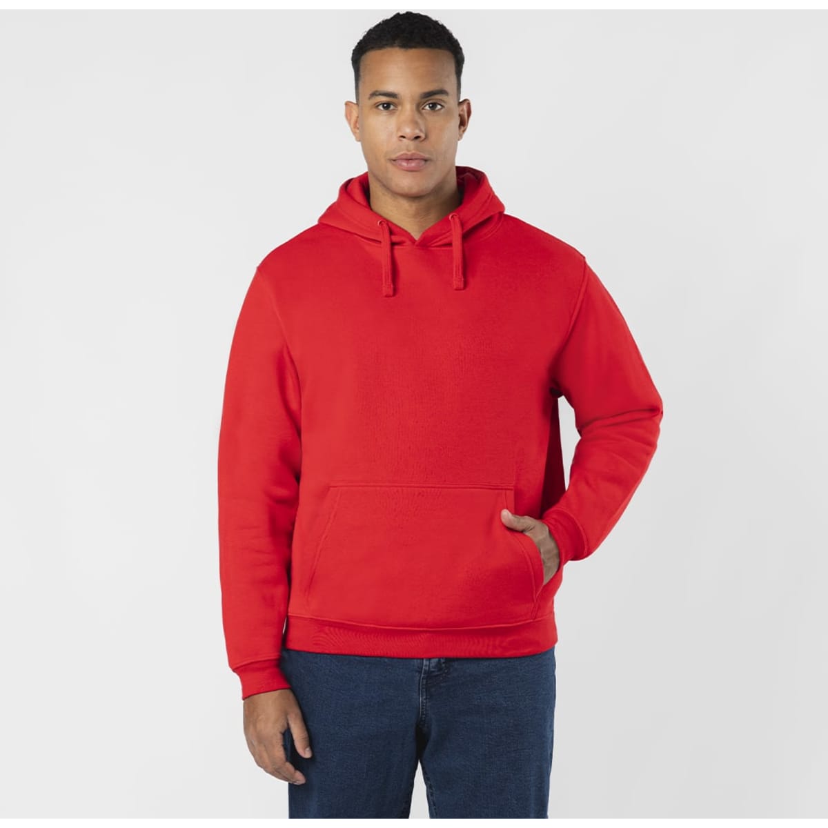 A red hoodie with a front pocket and drawstring hood, worn by a model standing against a plain background.