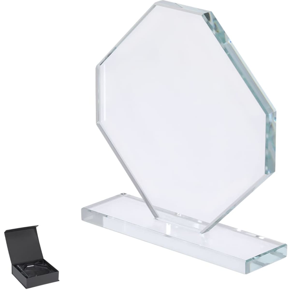 A clear octagonal glass trophy with a rectangular base, presented in a black gift box.