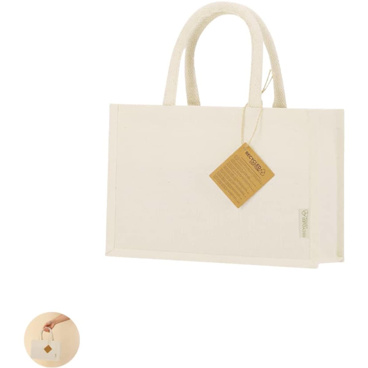 A cream tote bag with two handles and a tag attached, featuring a simple design and a branding logo.