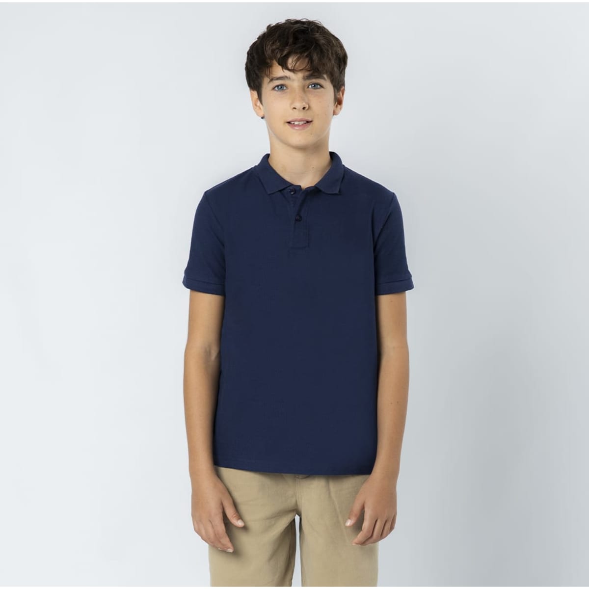 A navy blue polo shirt with a collar, featuring short sleeves and a logo.