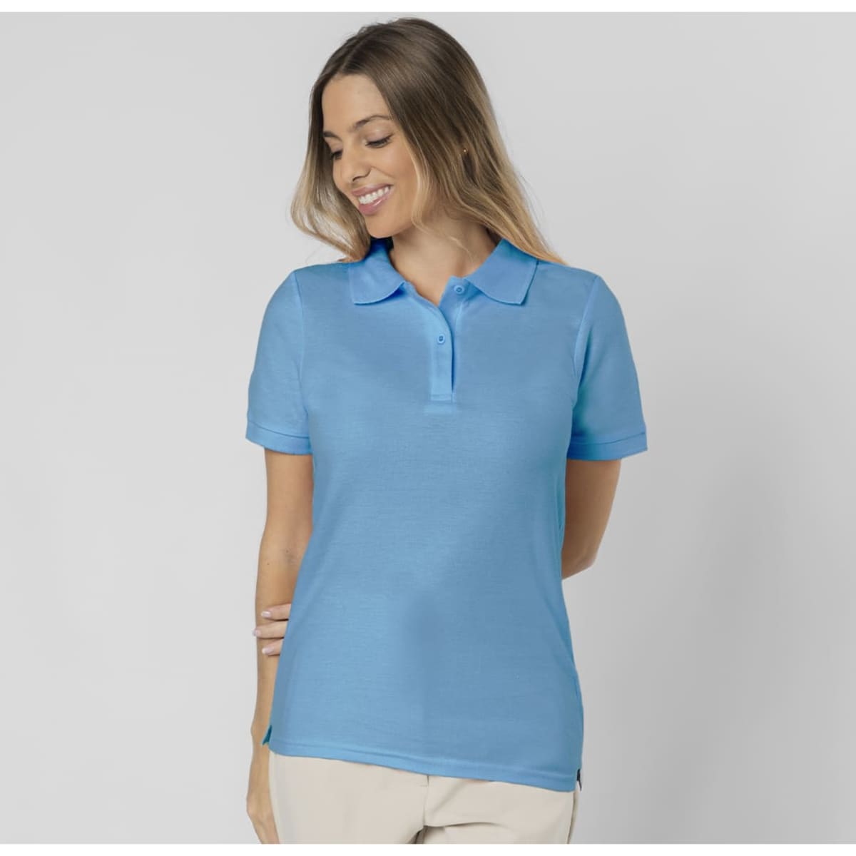 A blue polo shirt with a classic collar and short sleeves, featuring a logo.