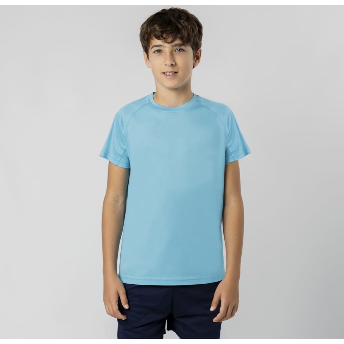 A blue Cocker T-Shirt for kids, featuring a round neckline and short sleeves, with a logo on it.