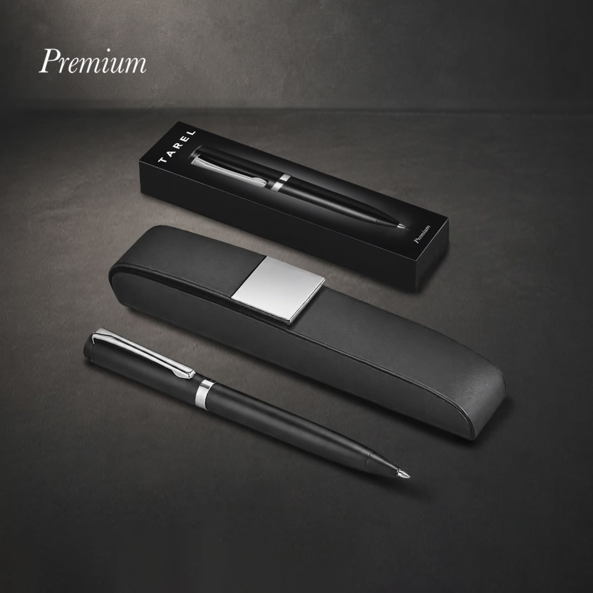 A black pen with a silver clip is displayed next to its sleek black box and case, featuring a logo.