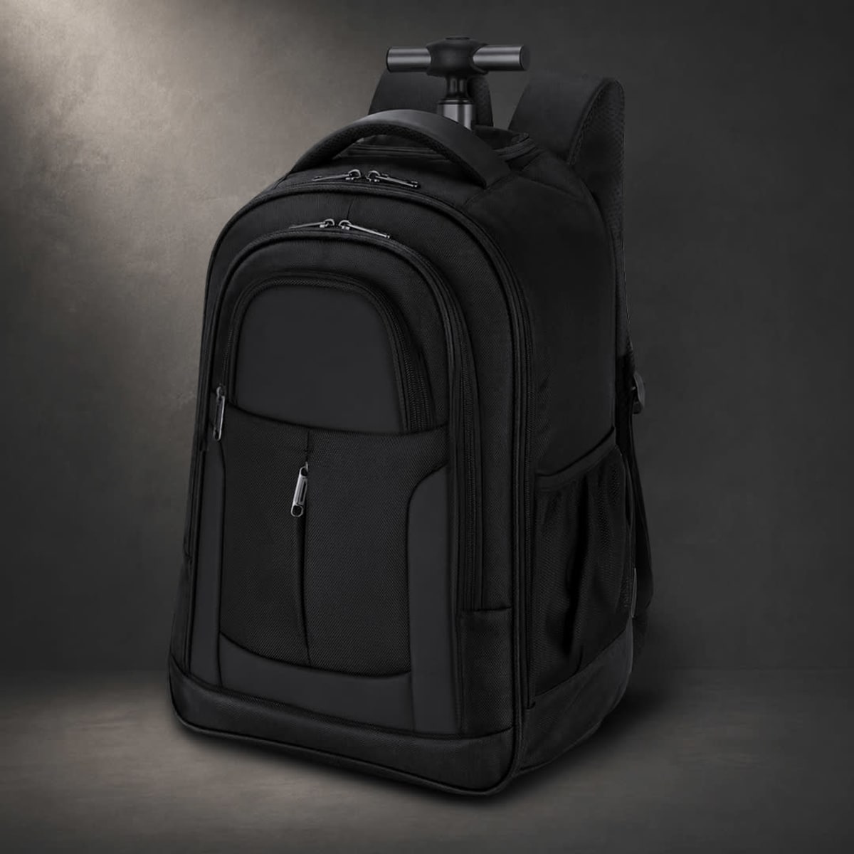 A black backpack with multiple compartments and a retractable handle, featuring a logo on one side.
