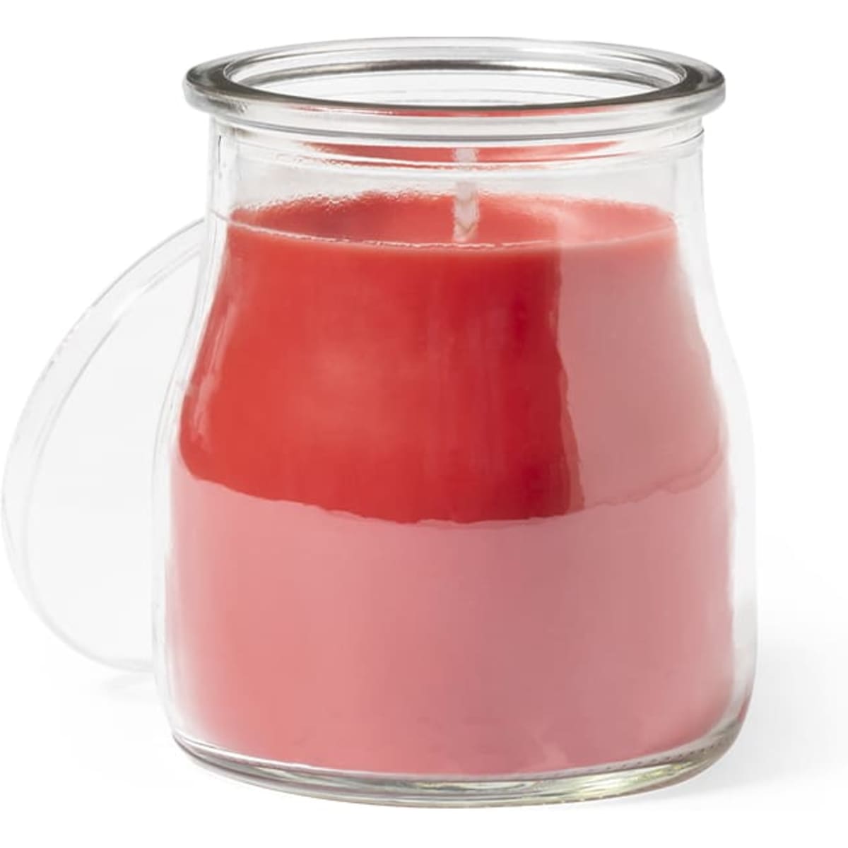 A glass jar candle featuring a red top layer and a pink bottom layer, complete with a fitted lid.