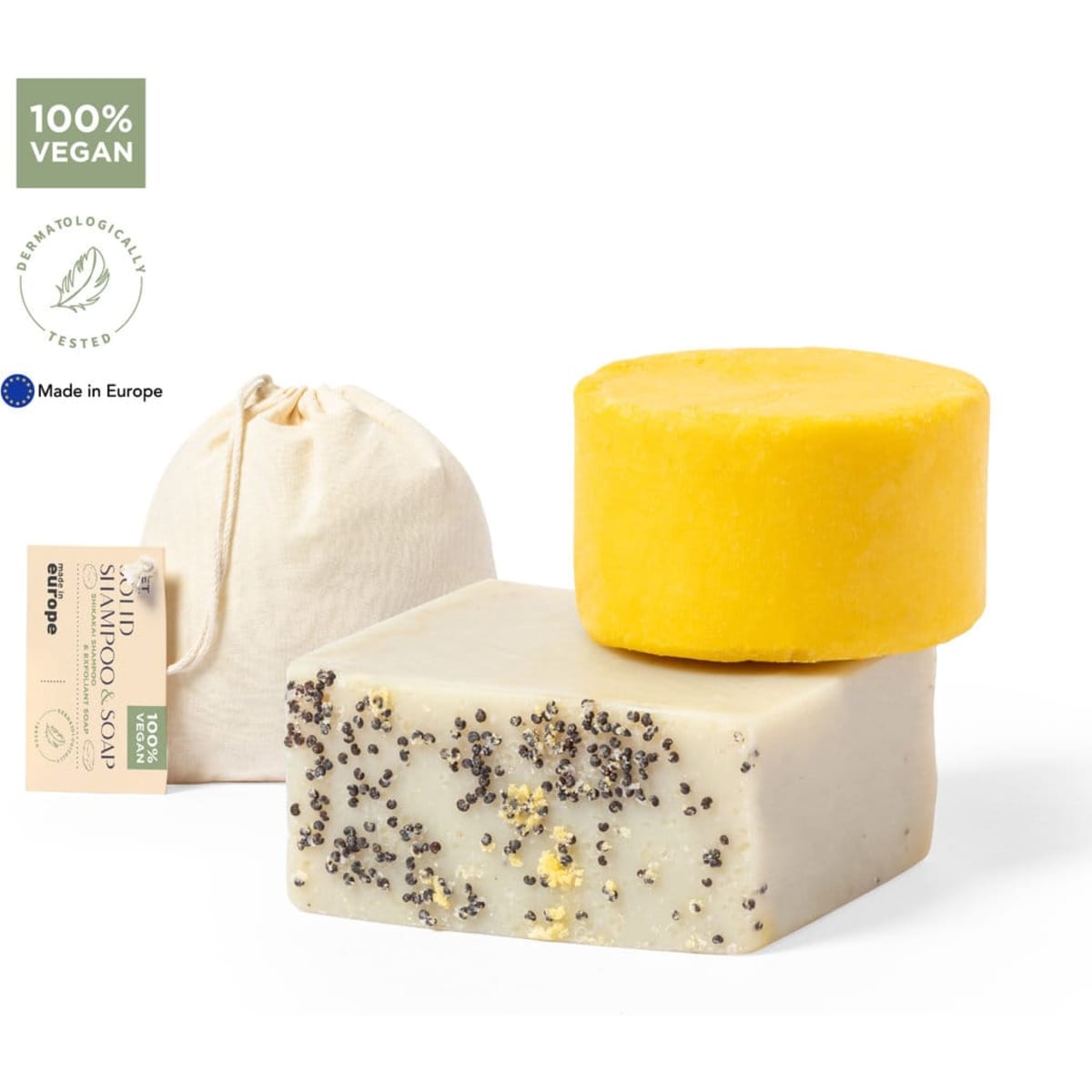 Three vegan soap bars in various colours: a lemon yellow round bar, a white square bar with specks, and a natural fabric pouch.