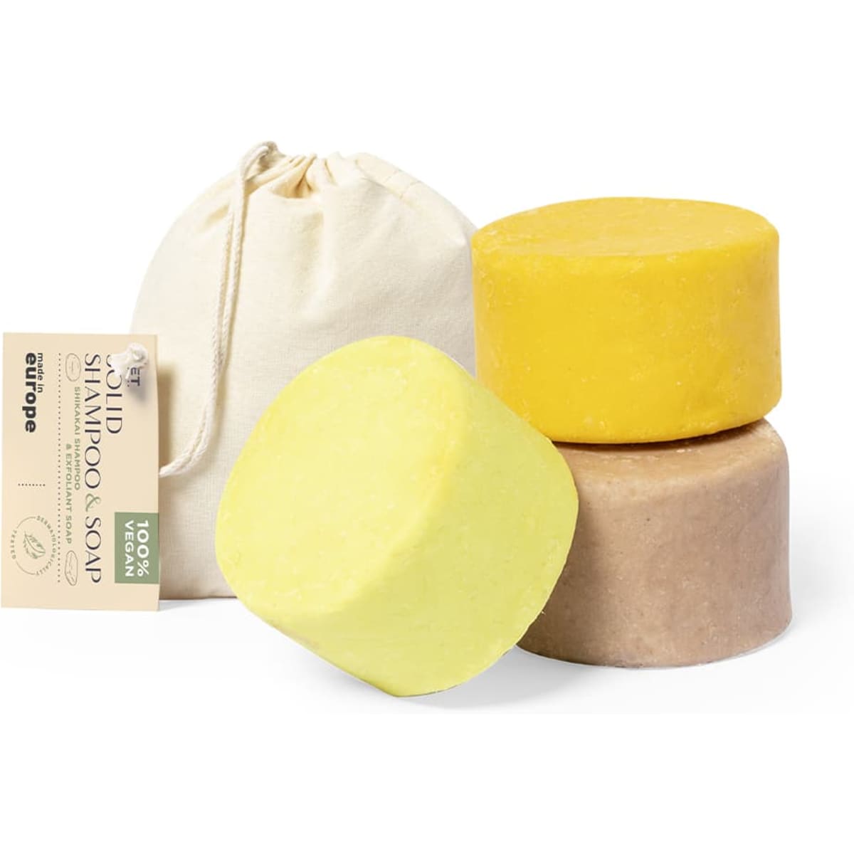 Three solid shampoo bars in yellow, brown, and cream, accompanied by a beige cloth pouch, with a product label.