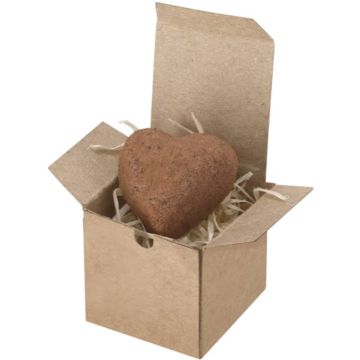 A heart-shaped chocolate truffle in a small, open brown cardboard box with straw filling. The box has a rustic appearance.