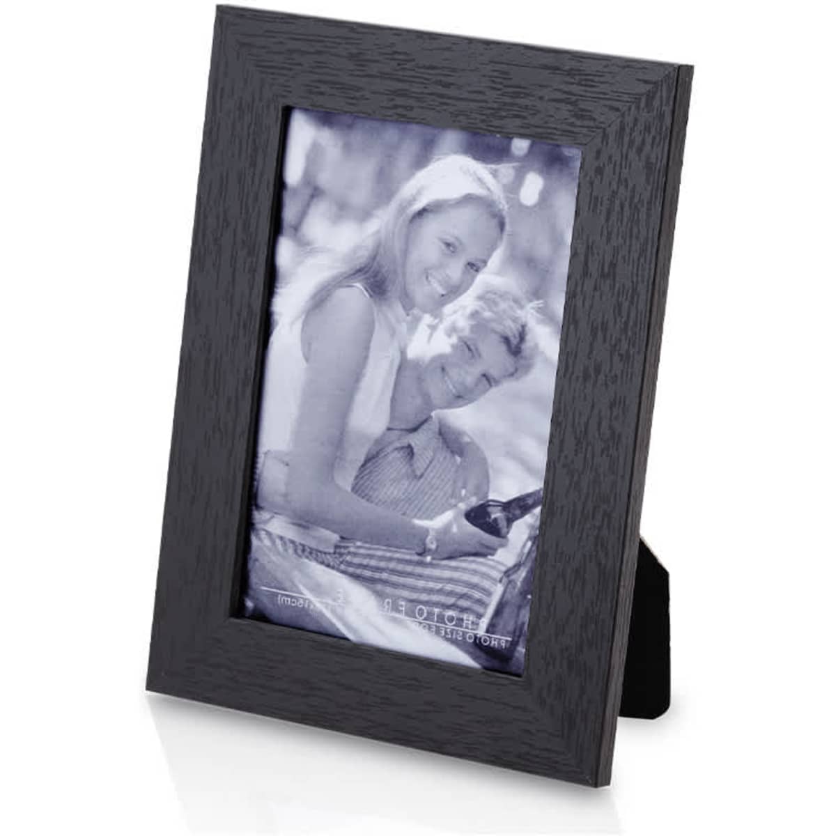 A black photo frame with a wooden texture displaying a black and white photograph of a couple.